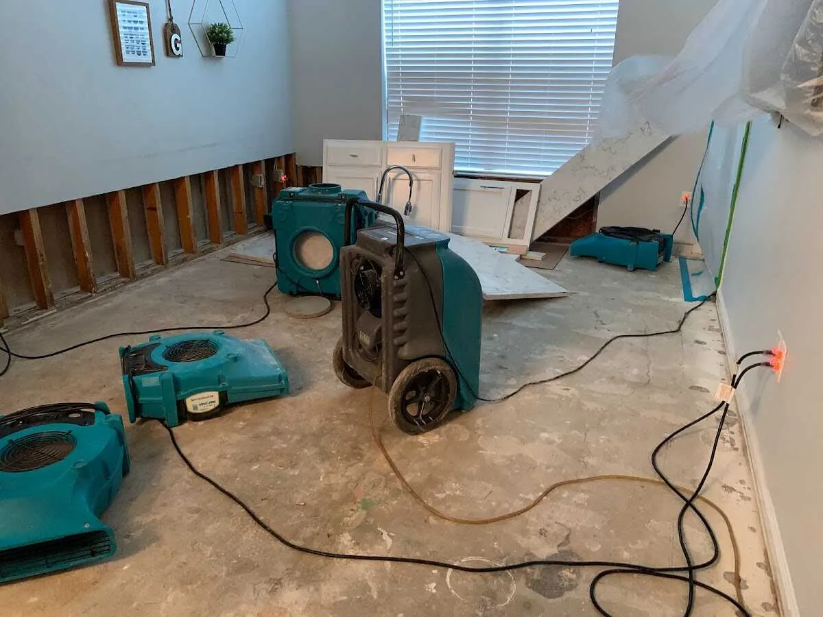 Dehumidifier in flood-cut room for Water Damage Restoration in Lynwood